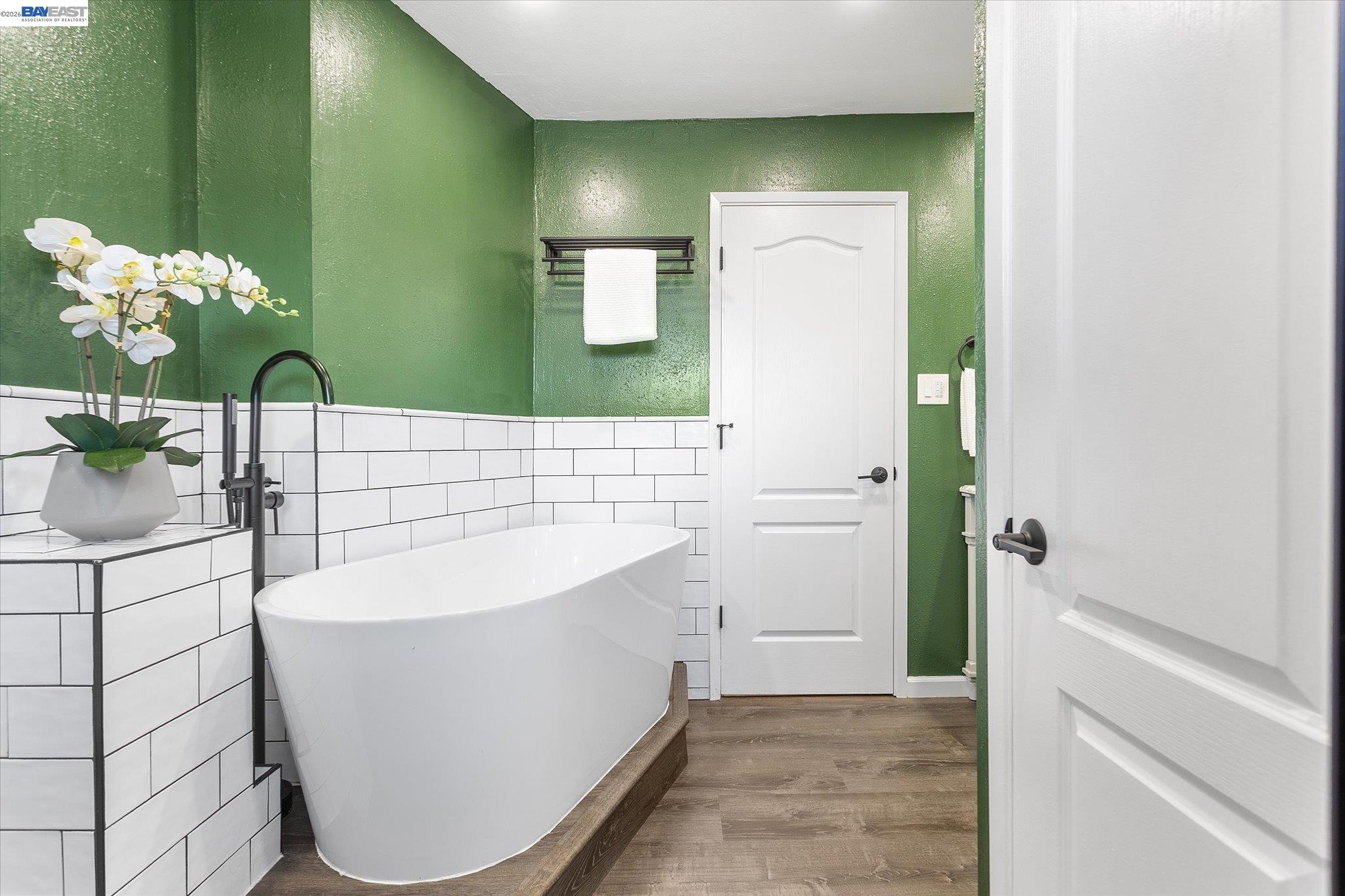 16683 Kildare Road Castro Valley, CA 94546 - Photo 56 of 77 a bath room with a sink and a mirror