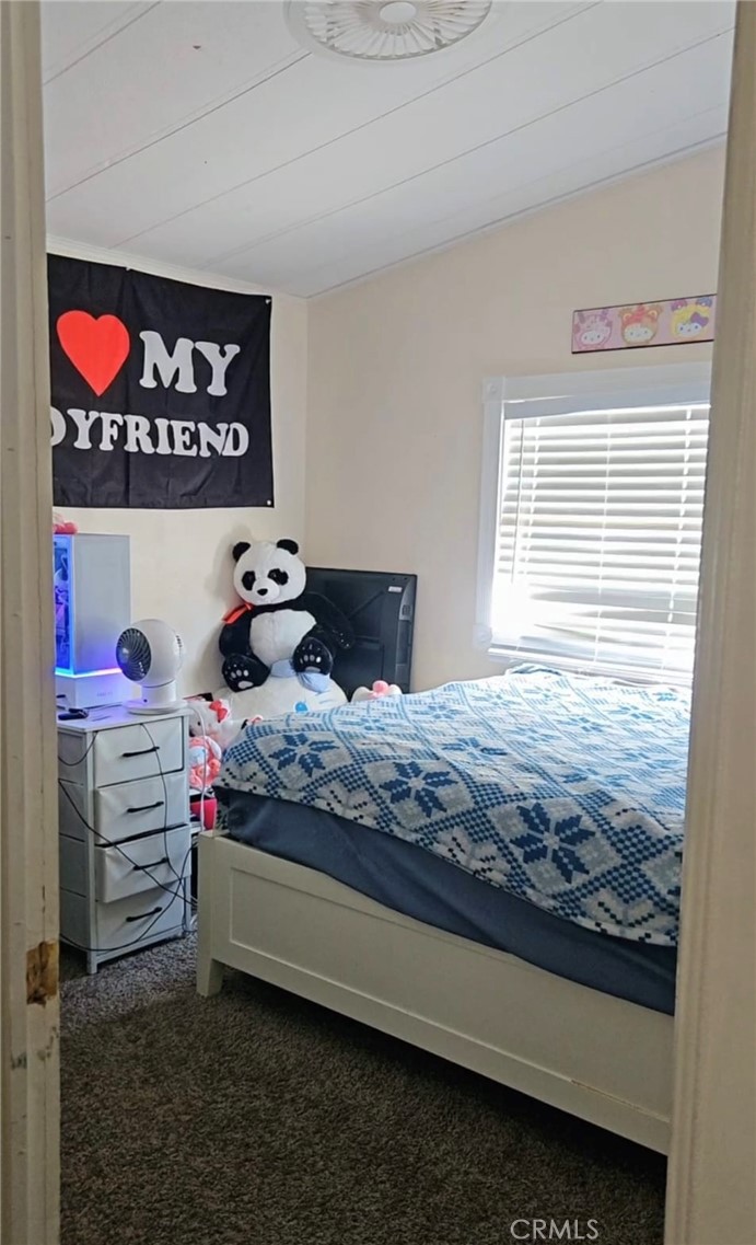 20683 Waalew Road, Unit B190 Apple Valley, CA 92307 - Photo 19 of 26 a bedroom with a bed and window