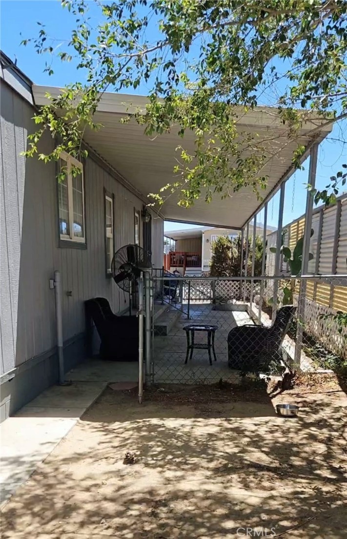 20683 Waalew Road, Unit B190 Apple Valley, CA 92307 - Photo 23 of 26 a view of a swimming pool with outdoor seating