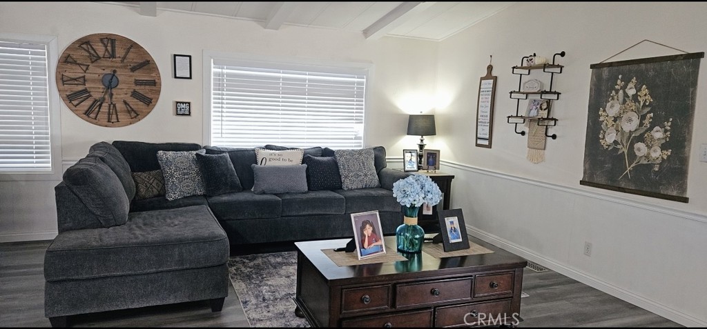 20683 Waalew Road, Unit B190 Apple Valley, CA 92307 - Photo 6 of 26 a living room with furniture a rug and a window