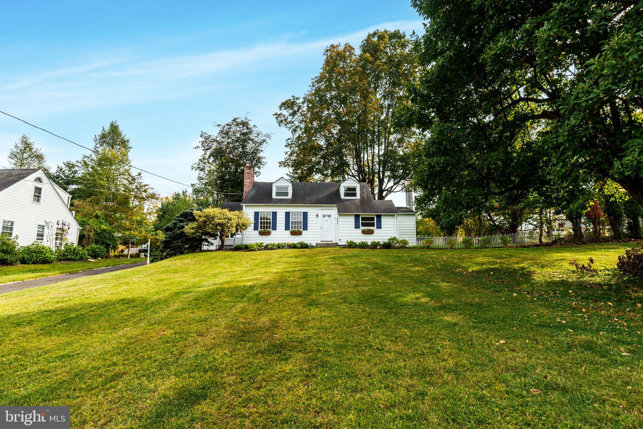 138 Summit Avenue Langhorne, PA 19047 - Photo 2 of 17 a front view of a house with a big yard