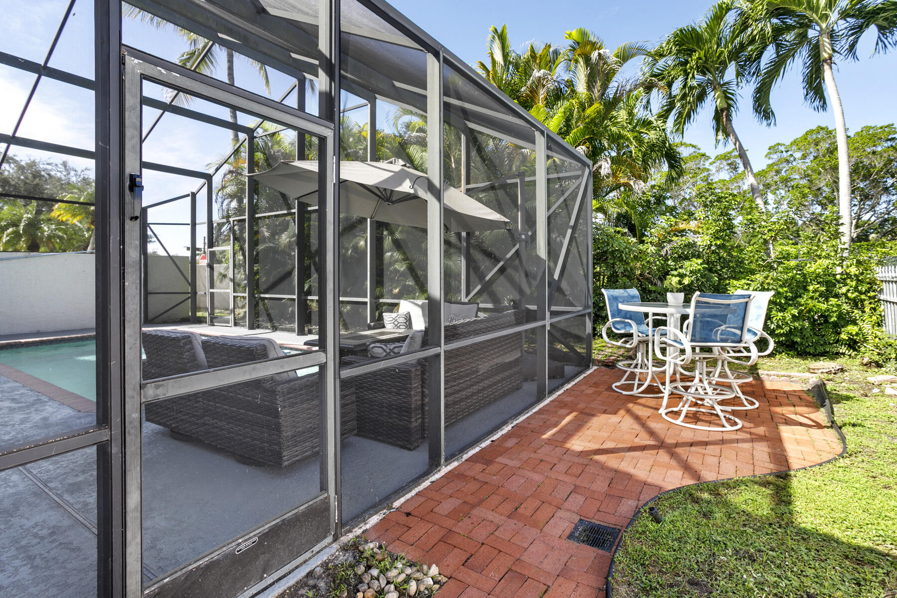 20335 Tierra Del Sol Court Boca Raton, FL 33498 - Photo 29 of 51 Paved Deck Outside Screened Pool Area