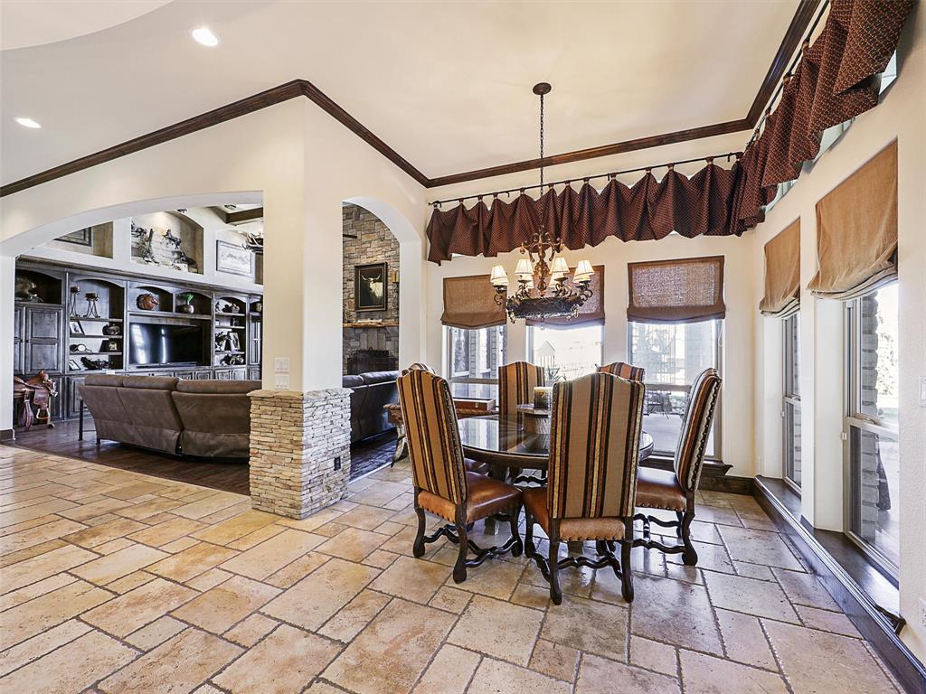 1200 McReynolds Road Sanger, TX 76266 - Photo 14 of 20 a view of a dining room with furniture and chandelier