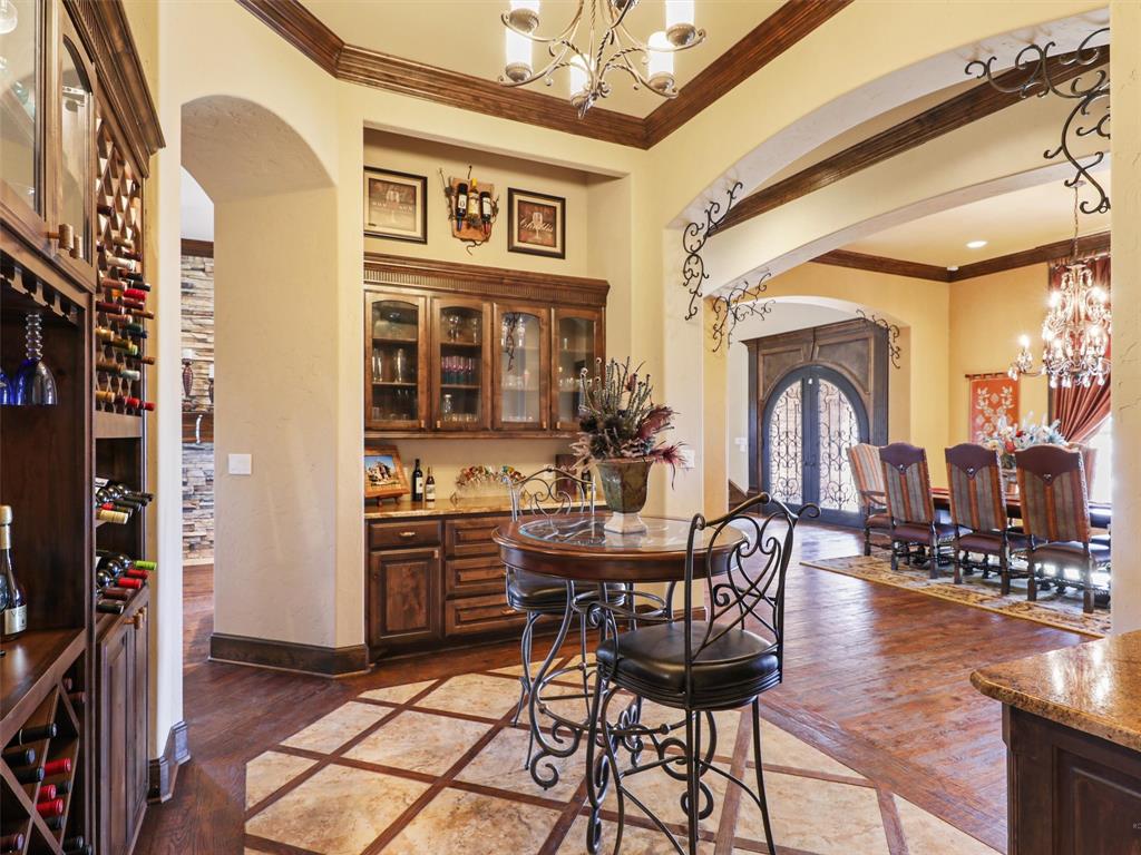 1200 McReynolds Road Sanger, TX 76266 - Photo 8 of 20 a dining room with furniture and wooden floor