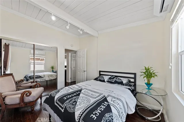 a bedroom with a bed and furniture