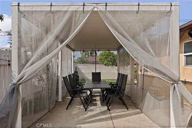 a view of balcony with furniture