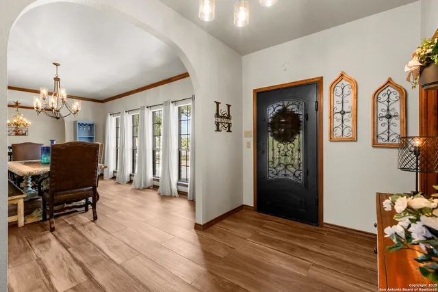 a view of a livingroom with furniture and wooden floor