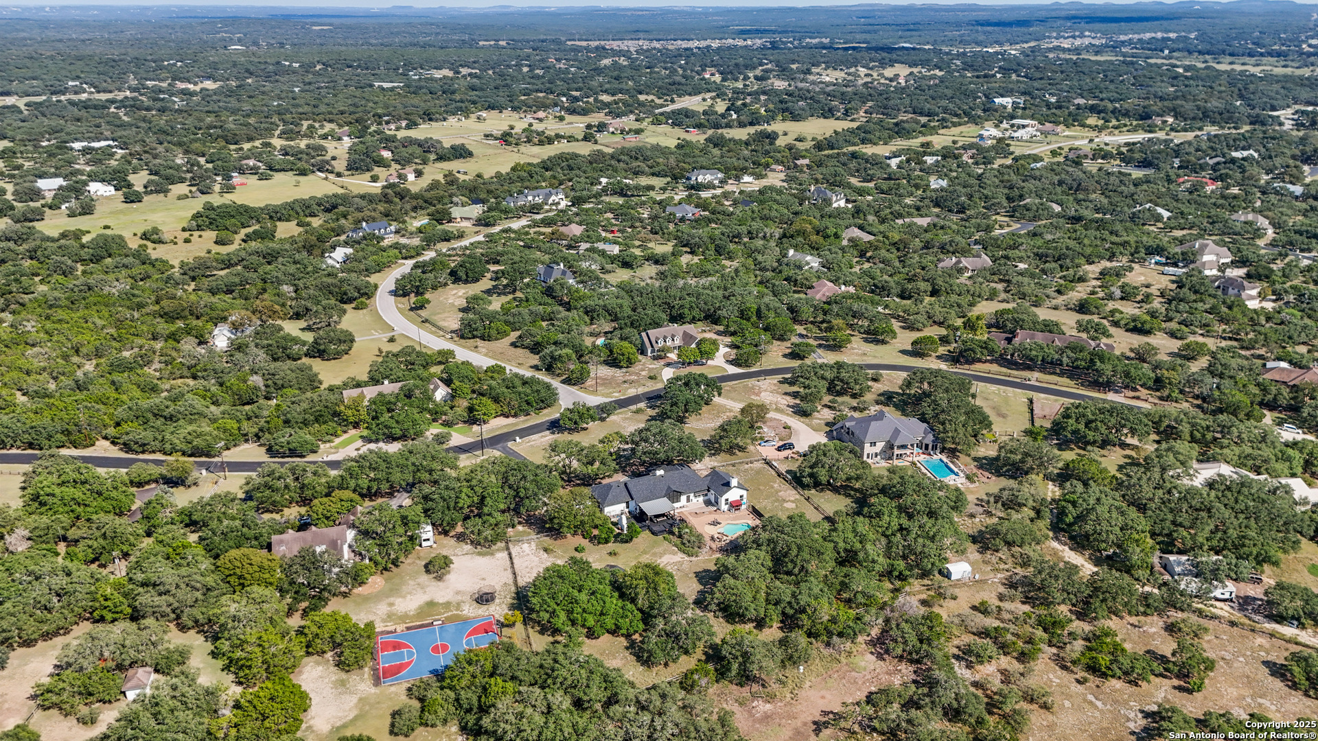 31421 Wild Oak Hill Fair Oaks Ranch, TX 78015 - Photo 48 of 50 an aerial view of residential houses with city view
