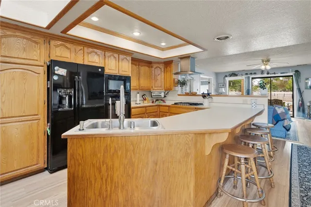a bed room with a bed furniture and a wooden floor