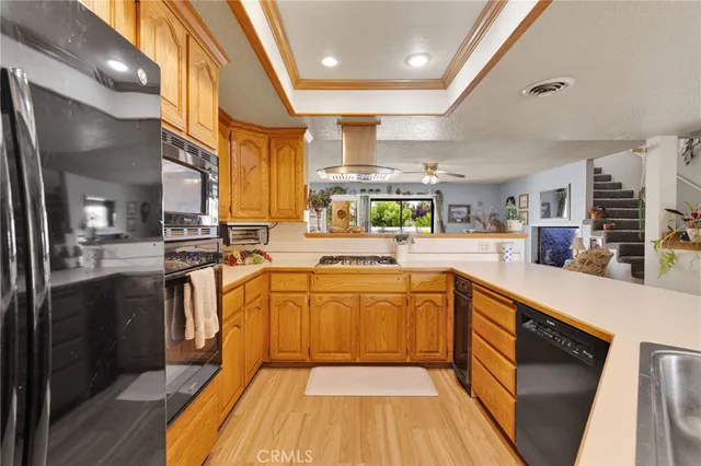 a bed room with a bed mirror and a night stand