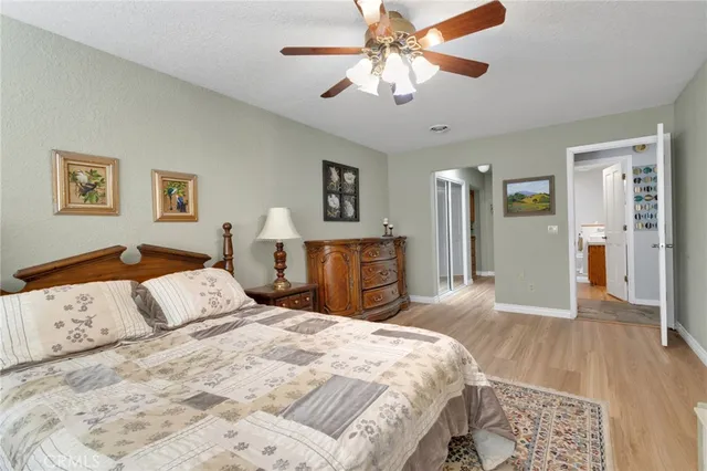 a bathroom with a sink a mirror and a shower