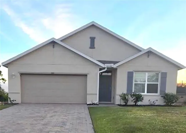 a front view of house with yard