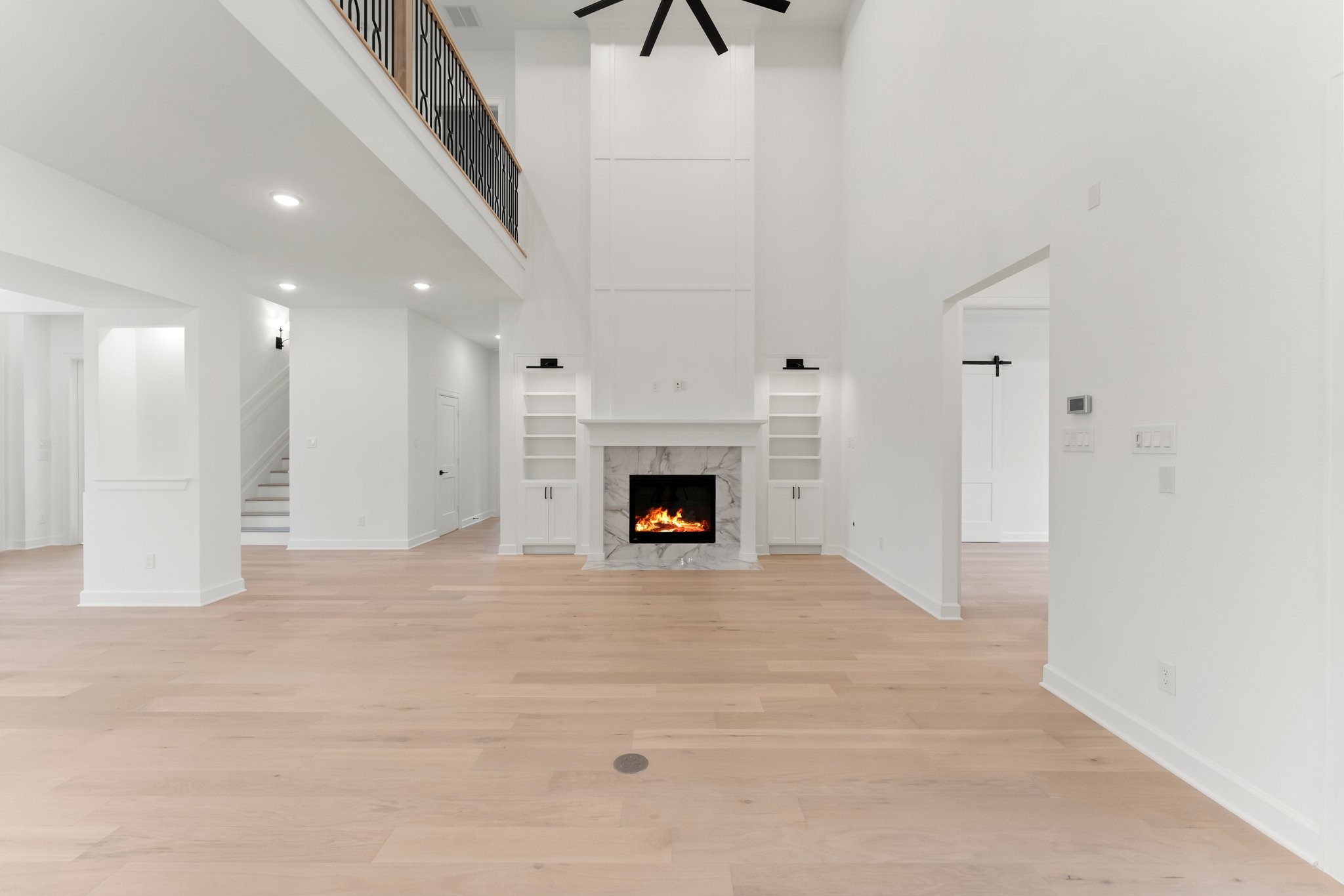 7315 Julie Pond Lane Spring, TX 77389 - Photo 22 of 48 a view of an empty room with a fireplace