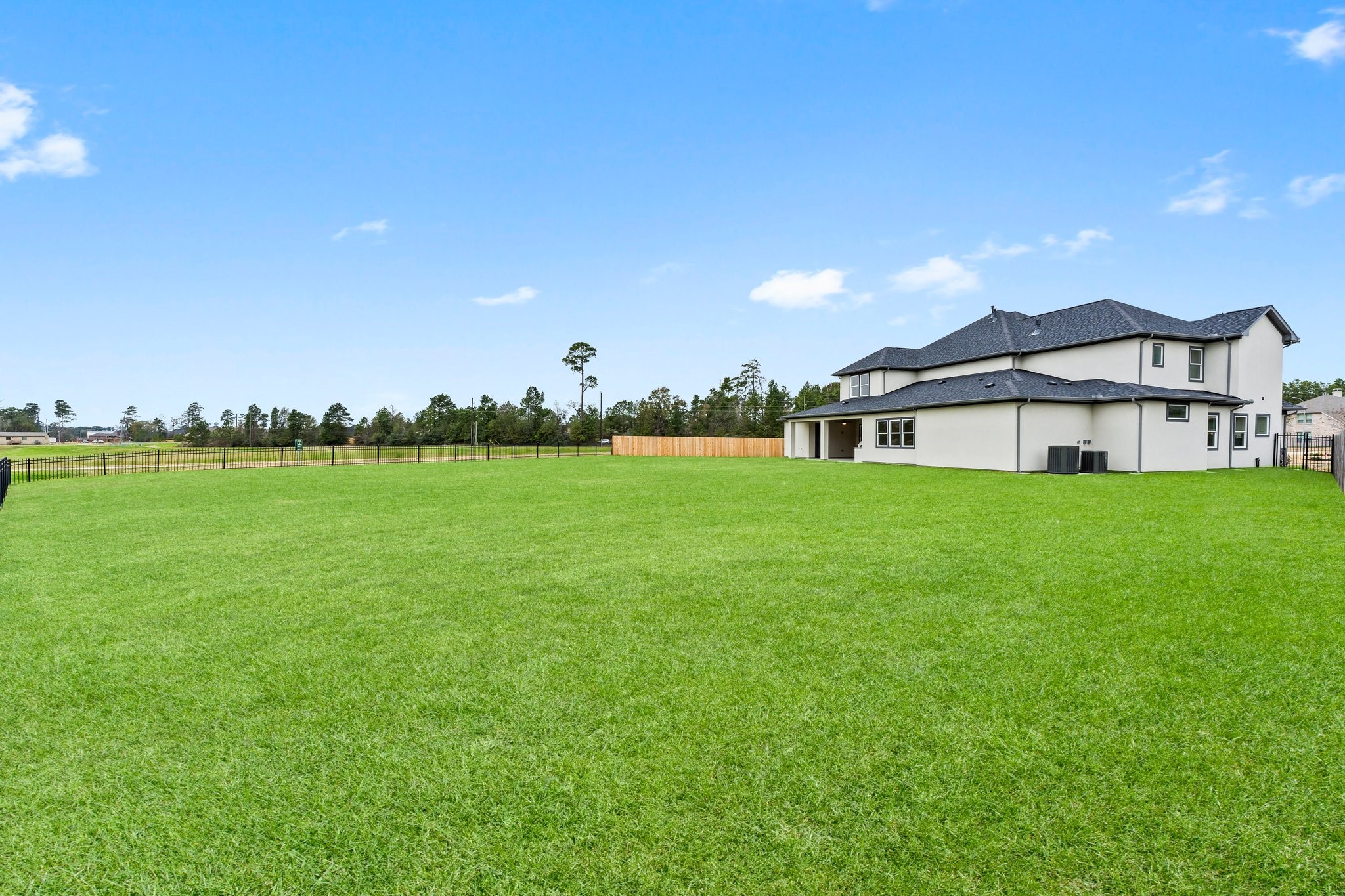 7315 Julie Pond Lane Spring, TX 77389 - Photo 46 of 48 a view of a house with a big yard