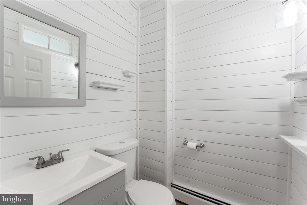 8 Convent Road Aston, PA 19014 - Photo 12 of 28 a bathroom with a toilet and sink