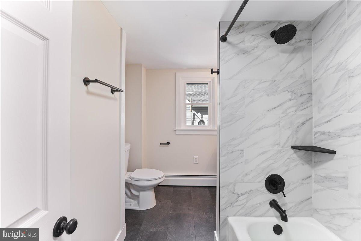 8 Convent Road Aston, PA 19014 - Photo 18 of 28 a bathroom with a sink and a toilet