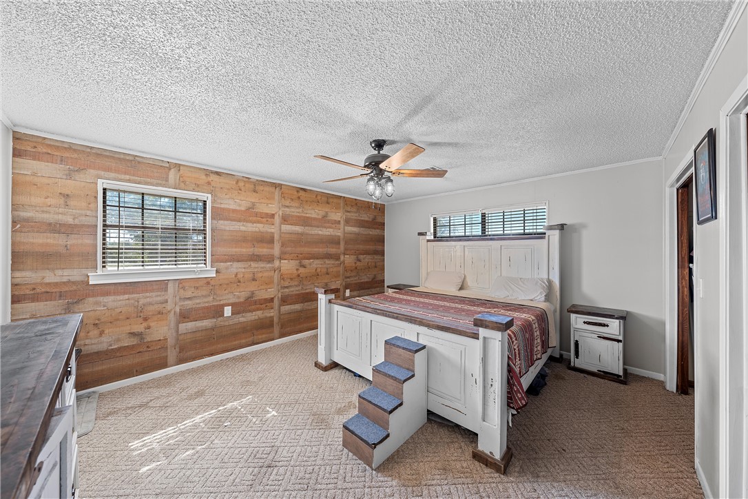 126 Cr 173 Road Marlin, TX 76661 - Photo 19 of 48 a bedroom with a bed and a dresser