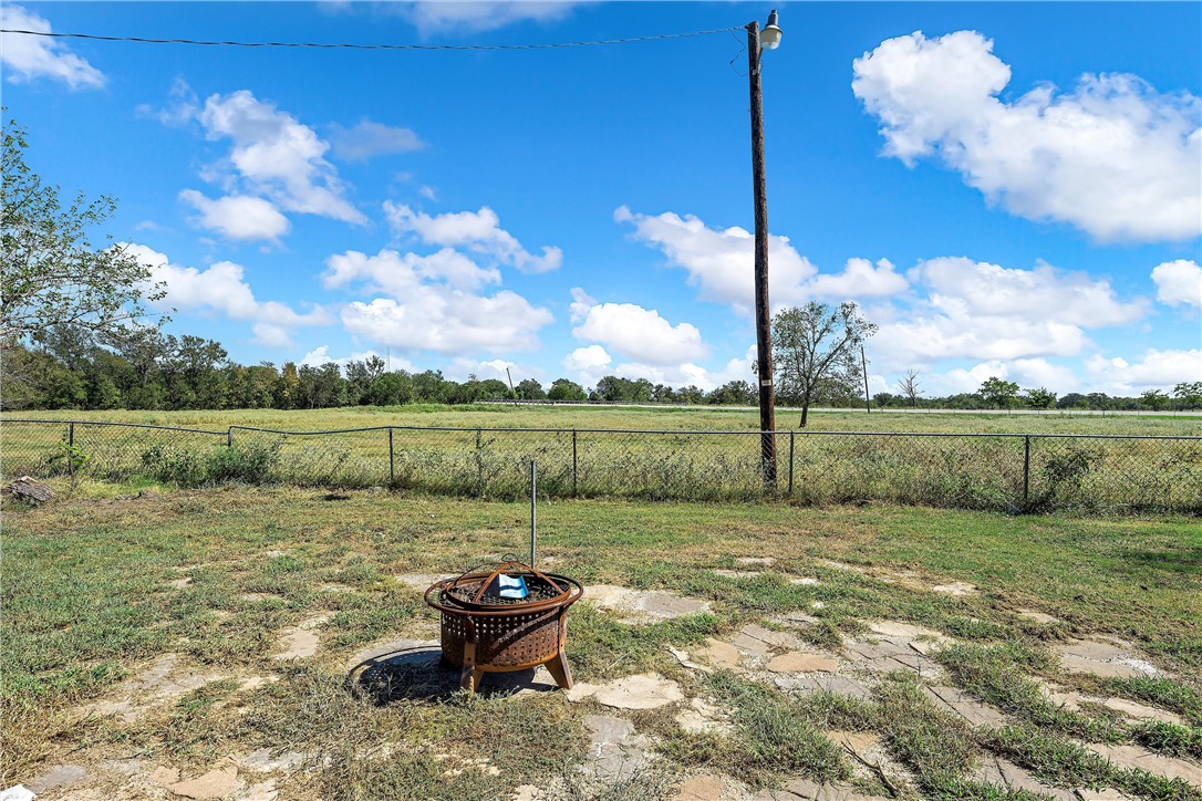 126 Cr 173 Road Marlin, TX 76661 - Photo 27 of 48 a view of a backyard with grass and a tree