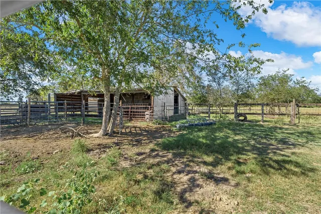a view of a golf course with a lake