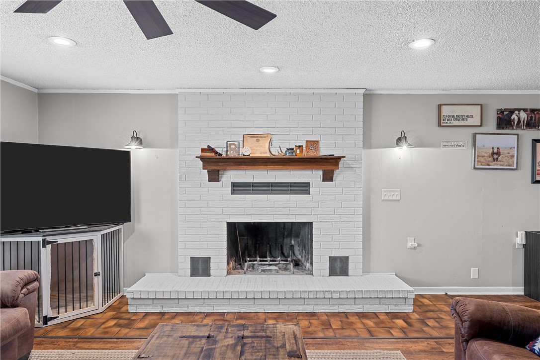126 Cr 173 Road Marlin, TX 76661 - Photo 7 of 48 a living room with furniture and a flat screen tv