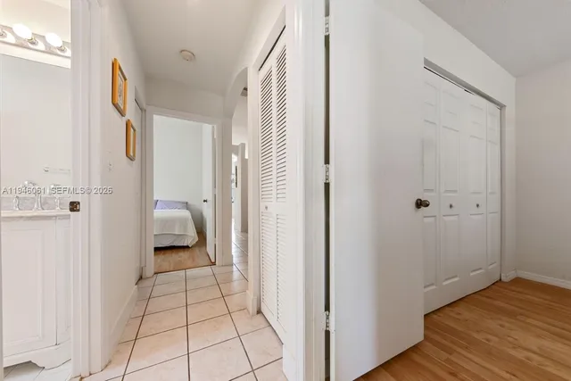 a bathroom with a sink and a shower
