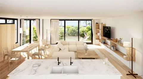 a living room with furniture and large windows