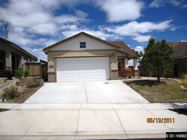 1226 Firefly Court Reno, NV 89523 - Photo 1 of 13 a white house with tree in the background