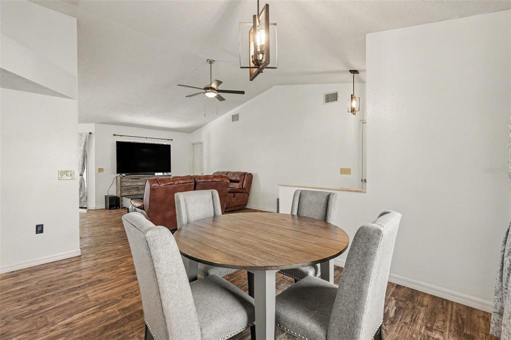 4156 Weldon Avenue Spring Hill, FL 34609 - Photo 12 of 26 a view of a dining room with furniture