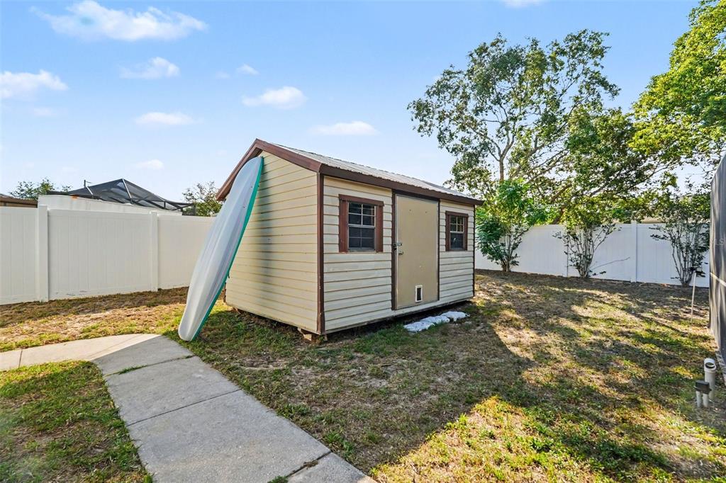 4156 Weldon Avenue Spring Hill, FL 34609 - Photo 25 of 26 a view of a house with a yard