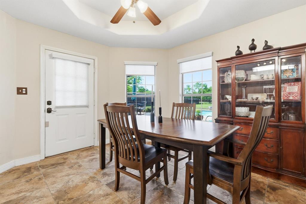 6000 Jackson Road Krum, TX 76249 - Photo 11 of 40 a view of a dining room with furniture window and outside view