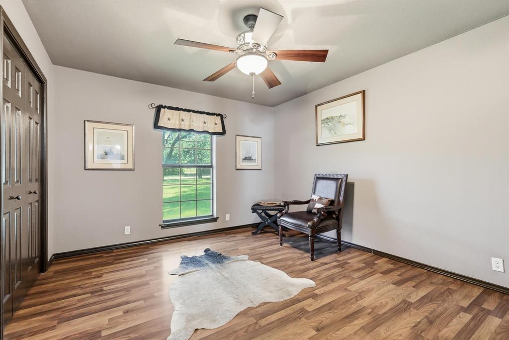 6000 Jackson Road Krum, TX 76249 - Photo 16 of 40 a living room with furniture and a window