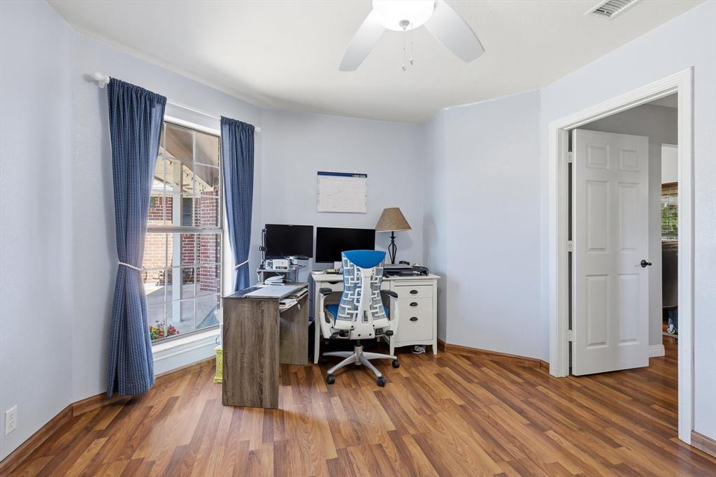 6000 Jackson Road Krum, TX 76249 - Photo 17 of 40 a workspace with wooden floor