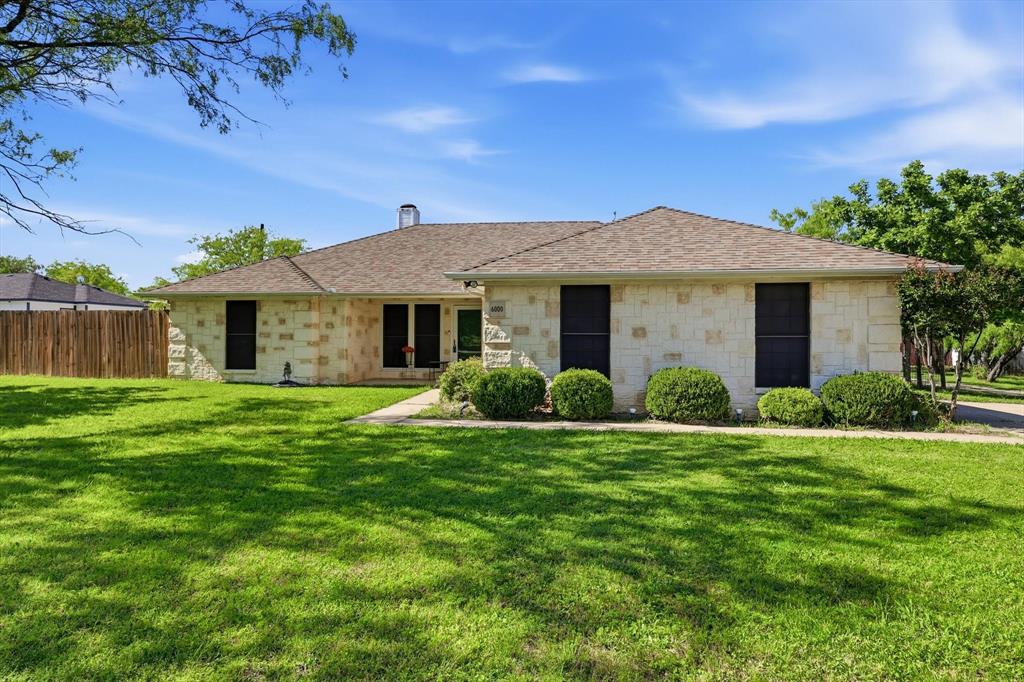 6000 Jackson Road Krum, TX 76249 - Photo 2 of 40 a front view of a house with a yard