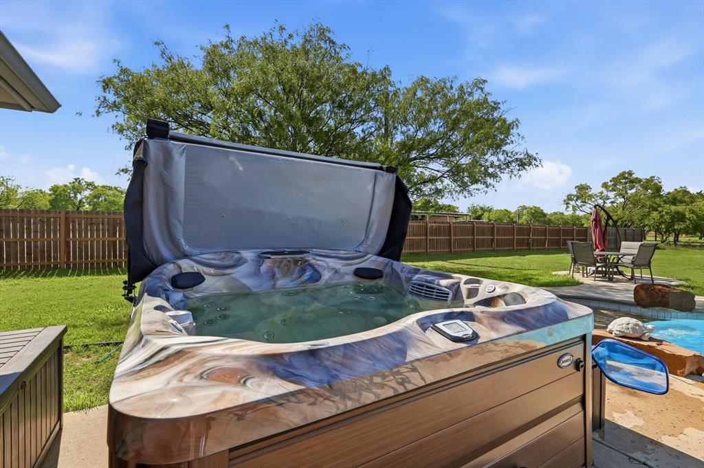 6000 Jackson Road Krum, TX 76249 - Photo 26 of 40 a view of a backyard with sitting area
