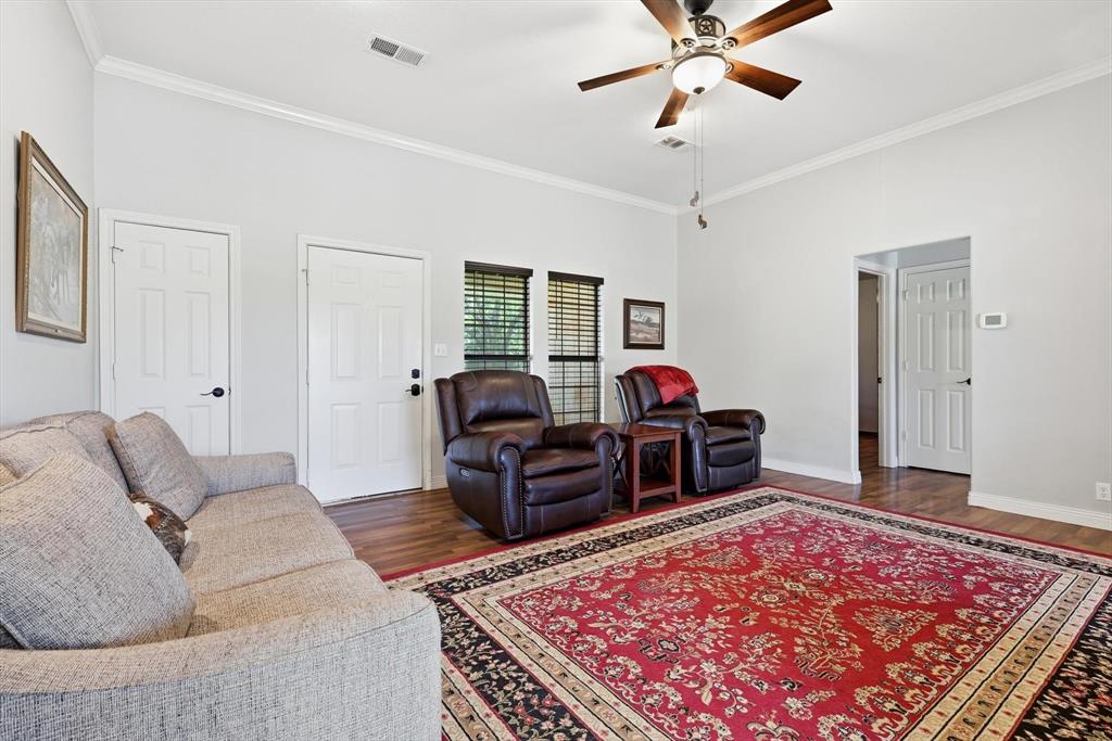 6000 Jackson Road Krum, TX 76249 - Photo 4 of 40 a living room with furniture and a rug