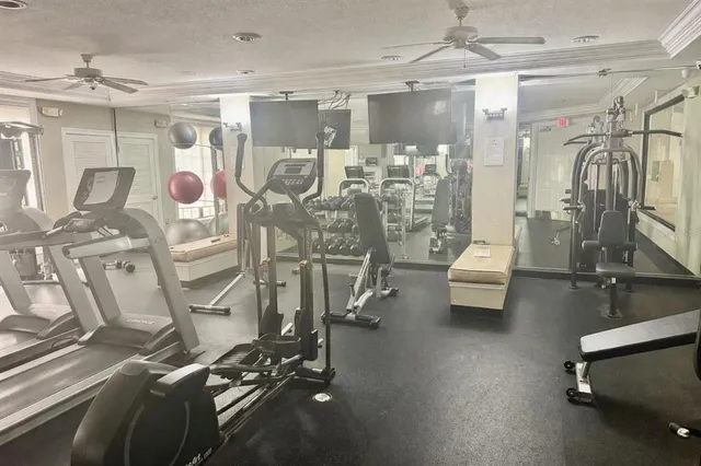 a view of a room with gym equipment