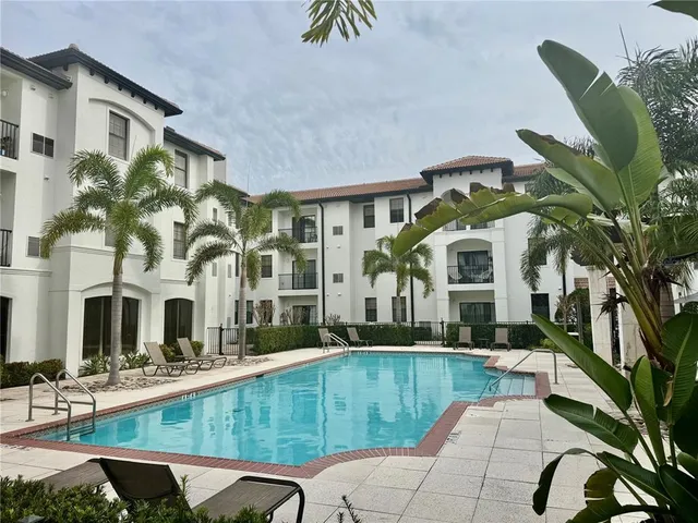 a view of a house with a swimming pool
