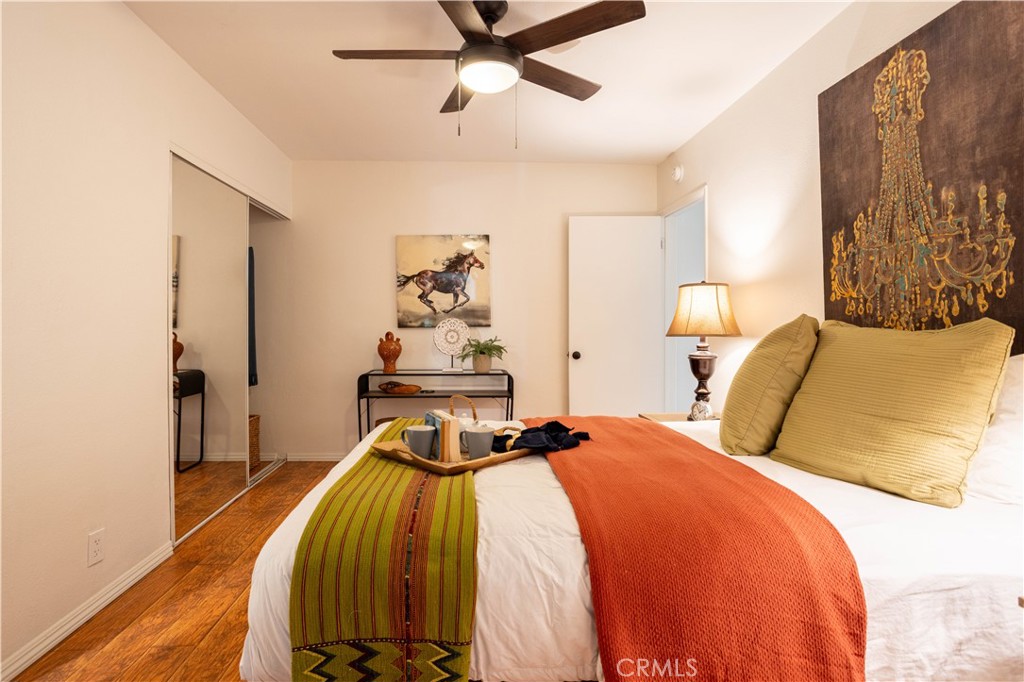 1514 Pilgrim Way Monrovia, CA 91016 - Photo 16 of 47 a bedroom with a bed and wooden floor