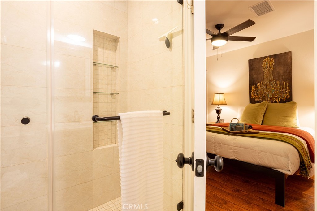 1514 Pilgrim Way Monrovia, CA 91016 - Photo 18 of 47 a bedroom with a bed and wooden floor