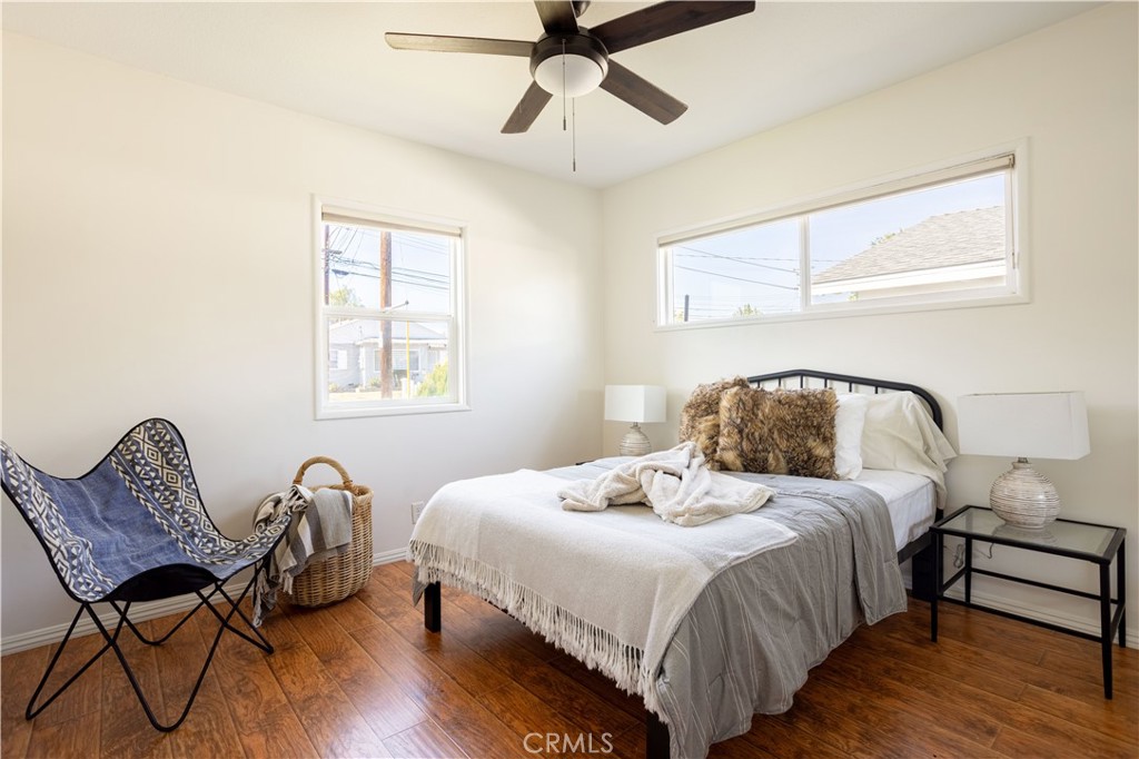 1514 Pilgrim Way Monrovia, CA 91016 - Photo 20 of 47 a bedroom with a bed and a chair