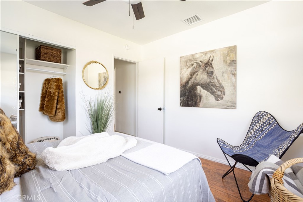 1514 Pilgrim Way Monrovia, CA 91016 - Photo 21 of 47 a bedroom with a bed and a chair