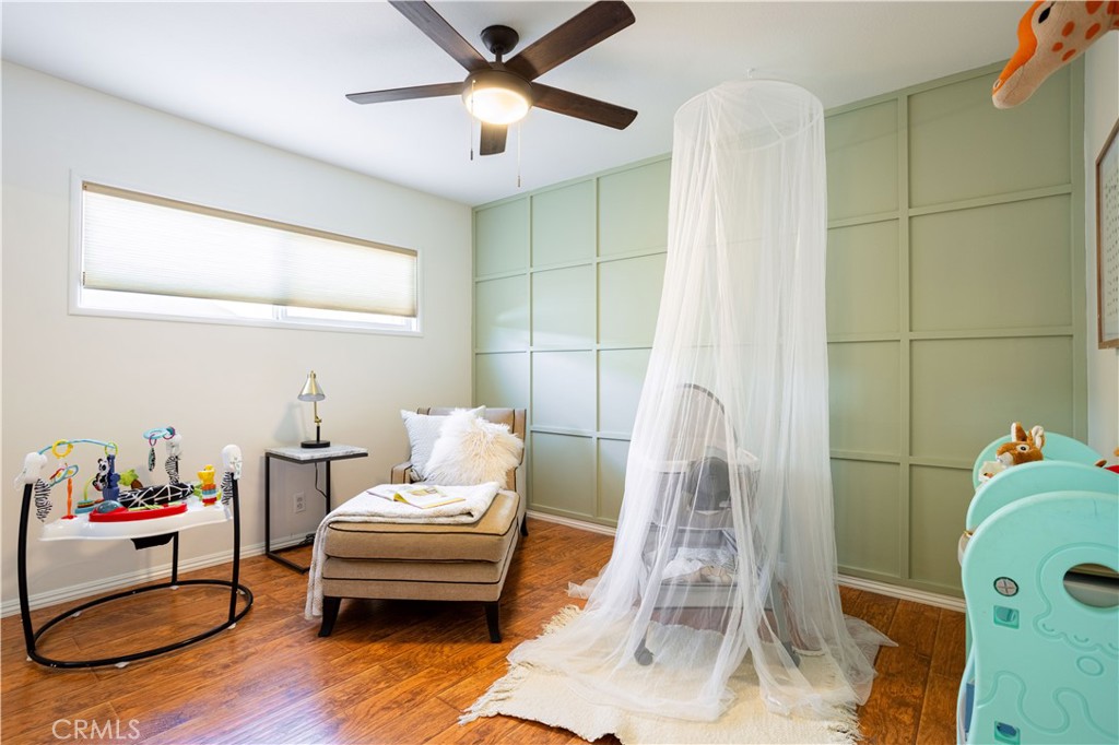 1514 Pilgrim Way Monrovia, CA 91016 - Photo 25 of 47 a living room with furniture and a chandelier