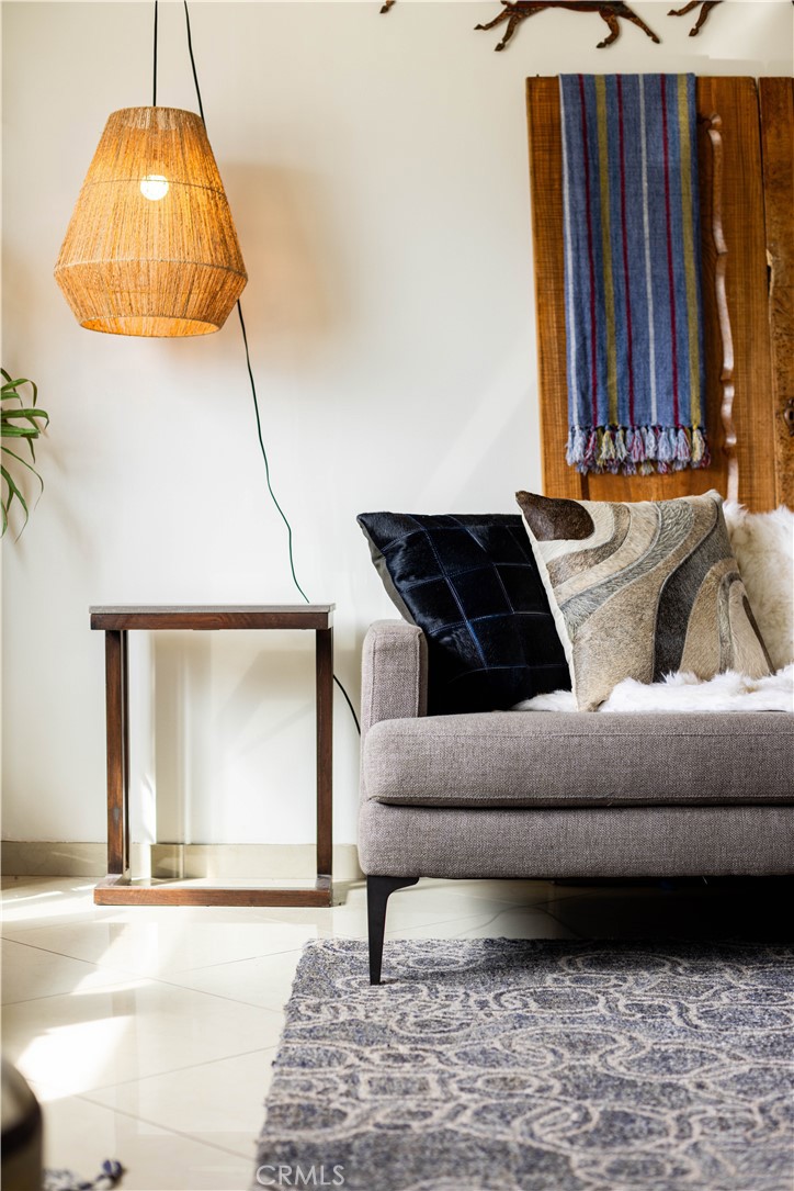1514 Pilgrim Way Monrovia, CA 91016 - Photo 8 of 47 a living room with a couch and a chandelier