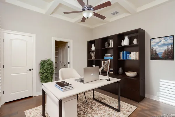 a view of a workspace with furniture