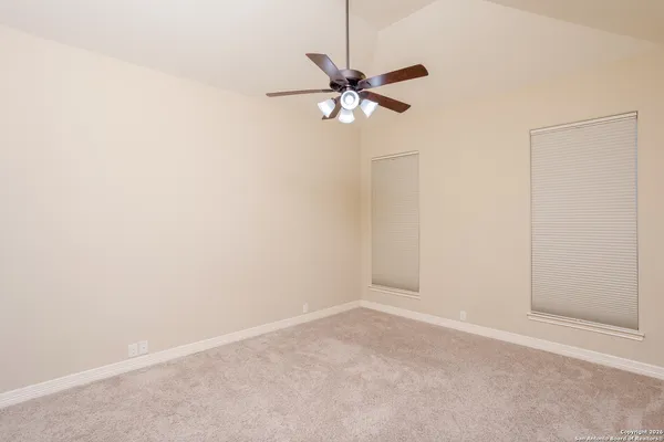 a view of a small space with a fan