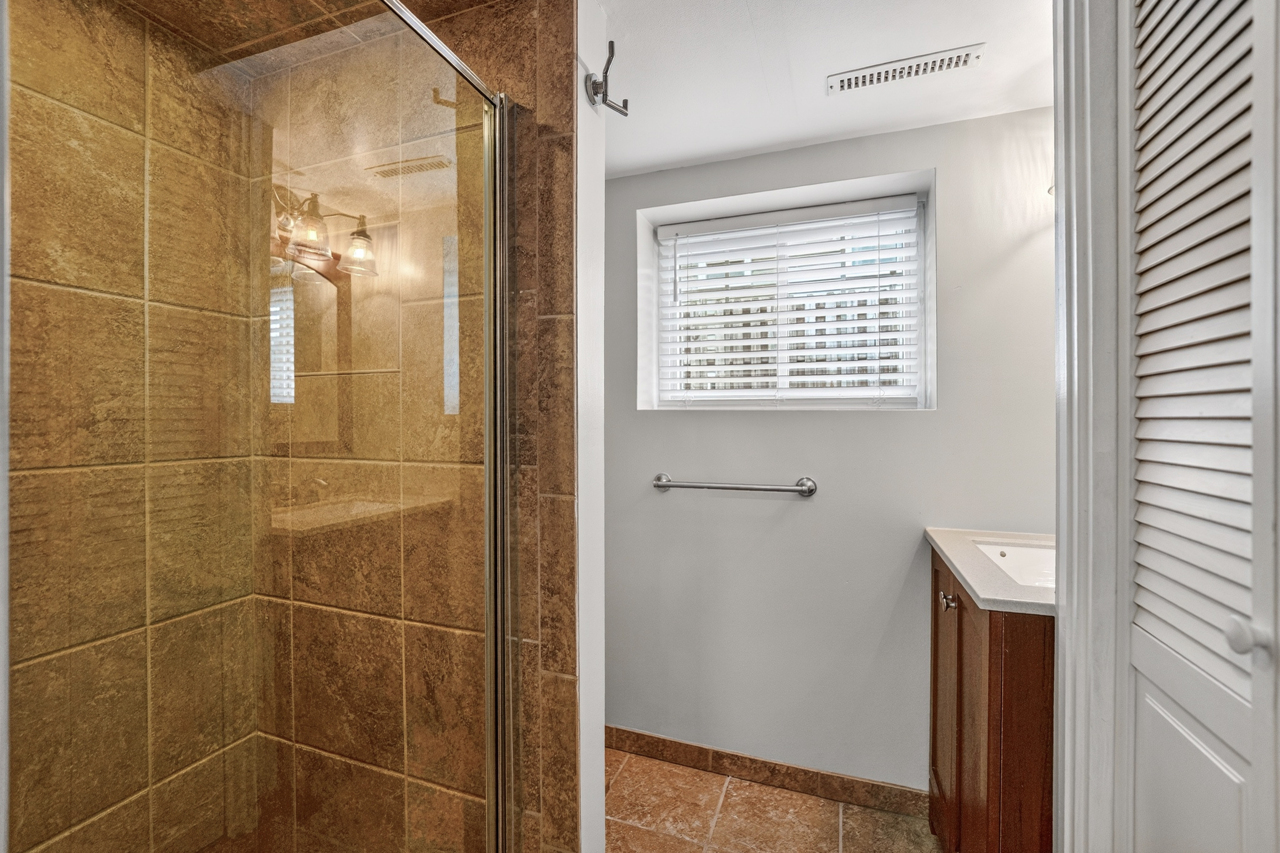 N049 Page Street Winfield, IL 60190 - Photo 12 of 31 a bathroom that has a window in it