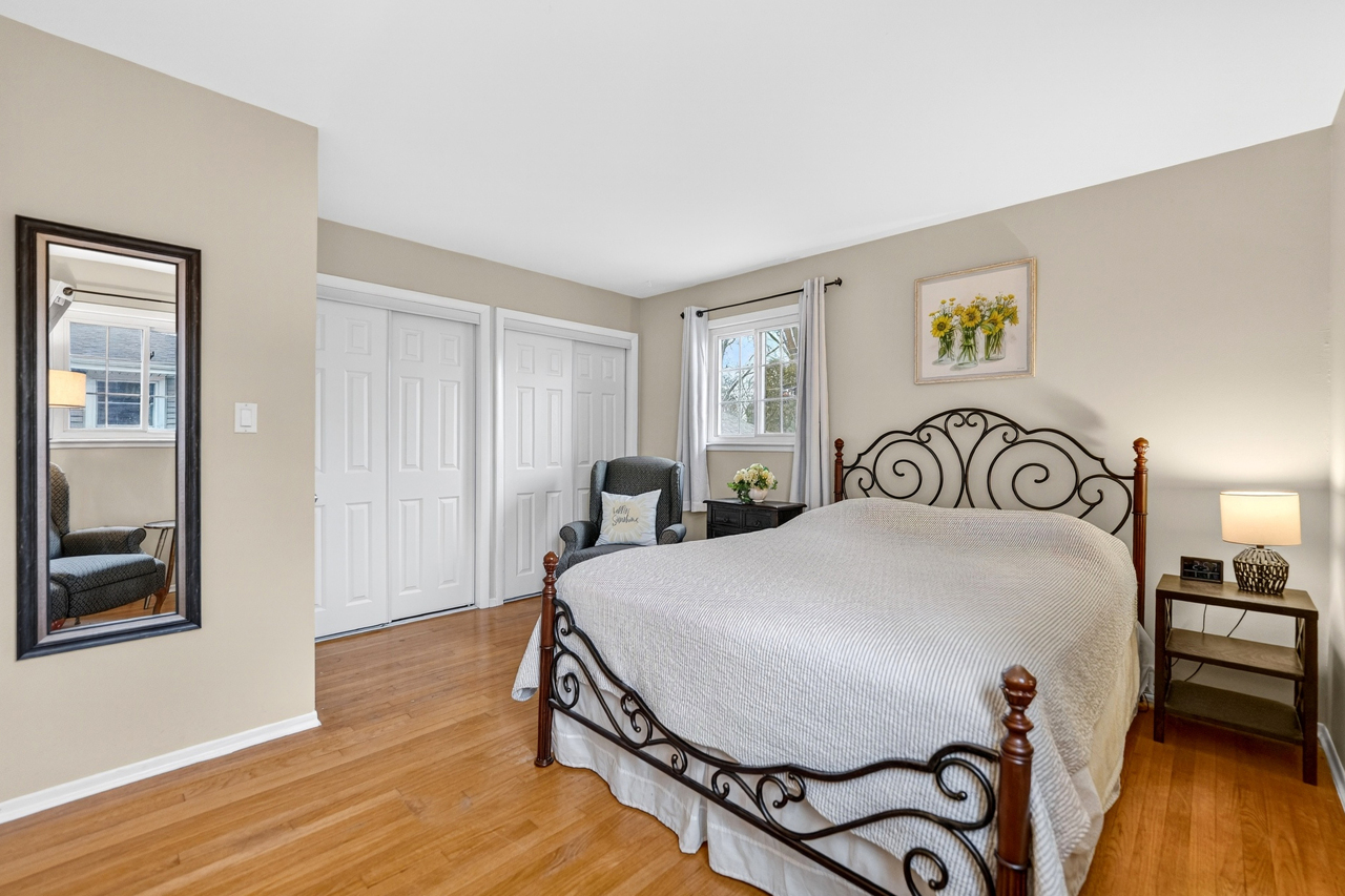 N049 Page Street Winfield, IL 60190 - Photo 16 of 31 a bedroom with a bed and wooden floor