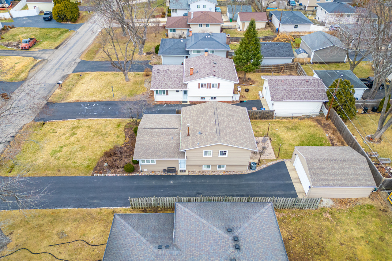 N049 Page Street Winfield, IL 60190 - Photo 27 of 31 an aerial view of a house with a swimming pool