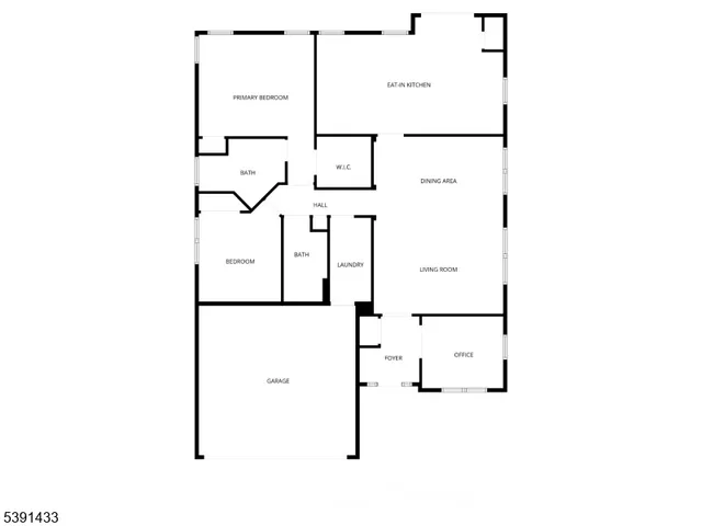 a view of a yard with a house and a large tree