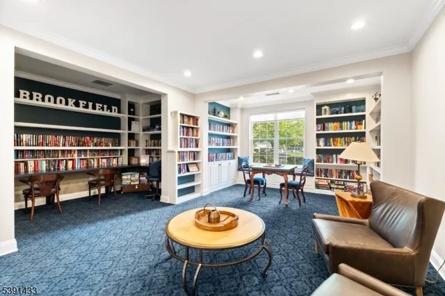 a room with table tennis pool table and chairs